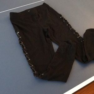Express black leggings. Lace up sides. Size Small.